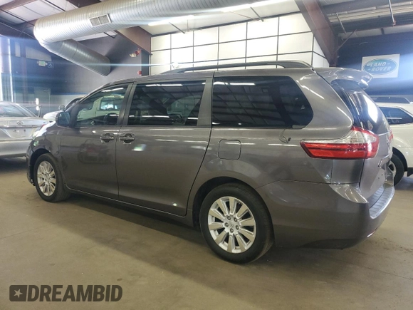2015 Toyota Sienna LE with VIN 5TDJK3DC7FS105502, listed as a Copart auction lot 61672045 with 183,035 mi miles and Clean title. Bid and sale history available at DreamBid. Image 2.