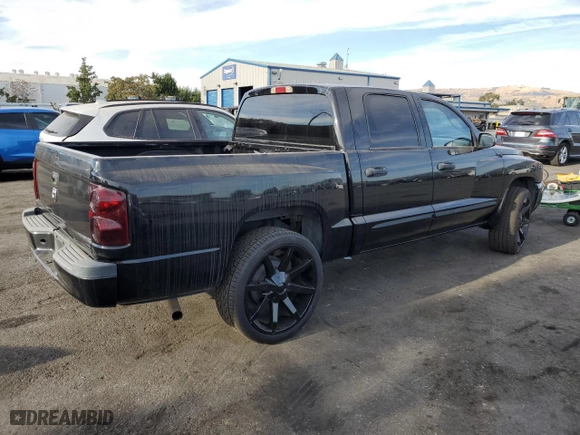 2006 Dodge Dakota SLT with VIN 1D7HE48K56S687447, listed as a Copart auction lot 74641494 with 174,798 mi miles and Salvage Title. Bid and sale history available at carsss.com. Image 3.