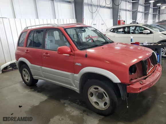 2004 Suzuki Grand Vitara LX with VIN JS3TD62V444101460, listed as a Copart auction lot 70063234 with 113,618 mi miles and Salvage Title. Bid and sale history available at carsss.com. Image 4.