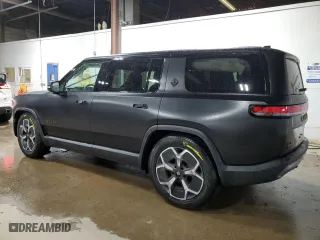 2024 Rivian R1S Adventure with VIN 7PDSGCBA0RN044942, listed as a Copart auction lot 78447784 with 6,731 mi miles and Salvage Title. Bid and sale history available at carsss.com. Image 2.