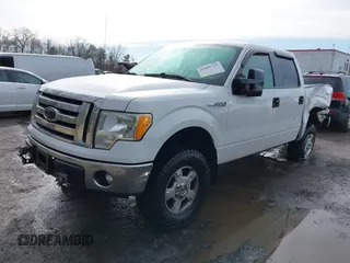 2011 Ford F-150 XL with VIN 1FTFW1EF8BKD27653, listed as a IAAI auction lot 41497710 with 199,061 mi miles. Bid and sale history available at carsss.com. Image 2.