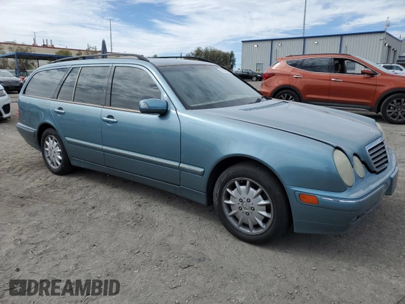 2001 Mercedes-Benz E-Class with VIN WDBJH65J01B292156, listed as a Copart auction lot 49556935 with 179,223 mi miles and Salvage Title. Bid and sale history available at carsss.com. Image 4.