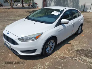 2016 Ford Focus SE z VIN 1FADP3F24GL268619, wystawiony jako IAAI lot #42750298 z przebiegiem 96 587 mil mil oraz . Historia ofert i sprzedaży dostępna na DreamBid. Obrazek 2.