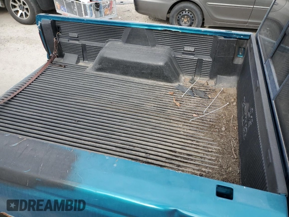 1997 Ford Ranger XLT with VIN 1FTCR14X0VPB40063, listed as a Copart auction lot 84930094 with 121,186 mi miles and Salvage Title. Bid and sale history available at DreamBid. Image 10.