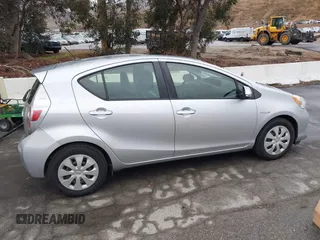2014 Toyota Prius One with VIN JTDKDTB33E1067408, listed as a IAAI auction lot 41573895 with 245,383 mi miles and . Bid and sale history available at DreamBid. Image 13.