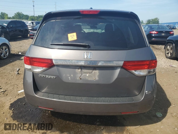 2014 Honda Odyssey EX-L with VIN 5FNRL5H61EB046093, listed as a Copart auction lot 61930335 with Not provided miles and Salvage title. Bid and sale history available at DreamBid. Image 6.