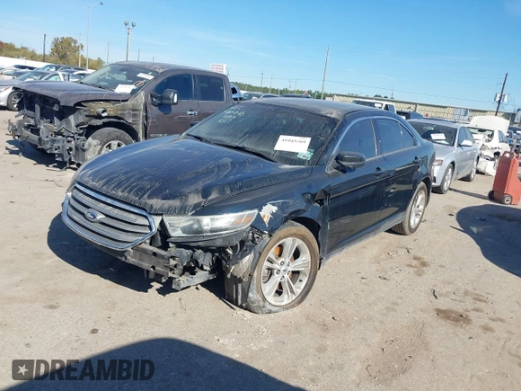 2014 Ford Taurus SEL z VIN 1FAHP2E84EG170133, wystawiony jako IAAI lot #41045369 z przebiegiem 261 732 mil mil oraz . Historia ofert i sprzedaży dostępna na DreamBid. Obrazek 2.