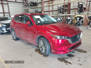 2024 Mazda CX-5 2.5 S Premium Package with VIN JM3KFBDL8R0470661, listed as a IAAI auction lot 41410715 with 14,100 mi miles. Bid and sale history available at carsss.com. Image 1.