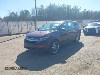 2019 Honda CR-V LX with VIN 2HKRW5H30KH414385, listed as a IAAI auction lot 41869188 with 91,473 mi miles and . Bid and sale history available at DreamBid. Image 2.