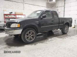 1997 Ford F-150 XL with VIN 1FTDX18W6VNB19712, listed as a IAAI auction lot 41740832 with 232,275 mi miles. Bid and sale history available at carsss.com. Image 2.