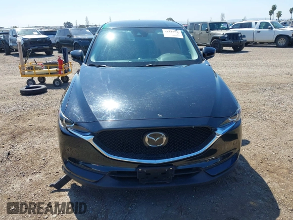 2020 Mazda CX-5 Sport with VIN JM3KFABM2L0761184, listed as a IAAI auction lot 41847768 with 47,582 mi miles. Bid and sale history available at carsss.com. Image 12.