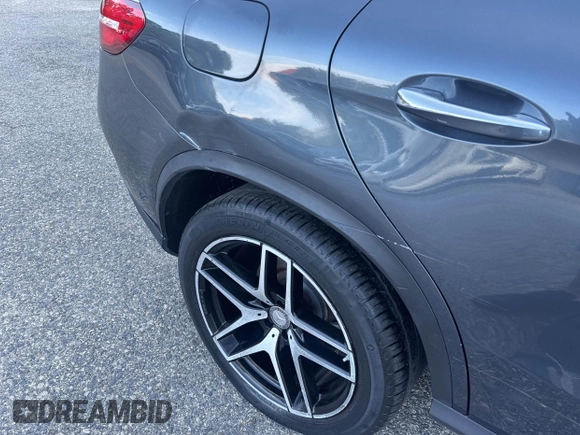 2016 Mercedes-Benz GLE 450 AMG with VIN 4JGED6EB3GA025787, listed as a IAAI auction lot 42643270 with 71,066 mi miles and . Bid and sale history available at DreamBid. Image 6.