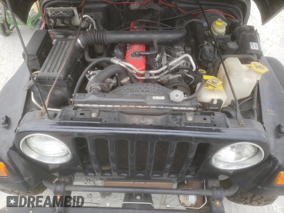 2002 Jeep Wrangler Sahara with VIN 1J4FA59S42P720513, listed as a Copart auction lot 47054805 with 190,922 mi miles and Salvage title. Bid and sale history available at DreamBid. Image 13.