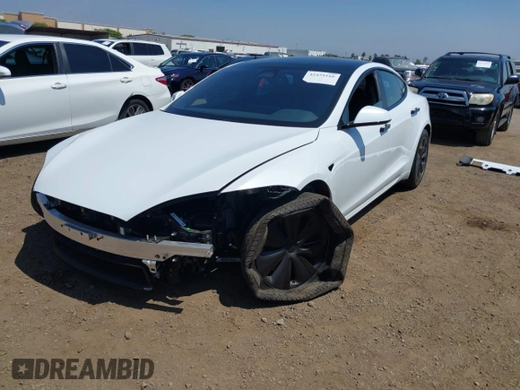 2023 Tesla Model S with VIN 5YJSA1E51PF499919, listed as a IAAI auction lot 42459166 with 6,612 mi miles and . Bid and sale history available at DreamBid. Image 20.
