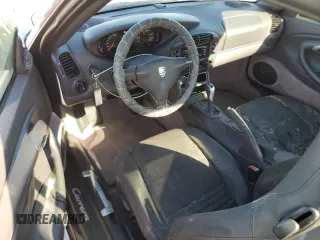 2000 Porsche 911 z VIN WP0AA2996YS621130, wystawiony jako Copart lot #77096434 z przebiegiem Nie podano mil oraz Szkoda całkowita • Salvage title. Historia ofert i sprzedaży dostępna na DreamBid. Obrazek 8.