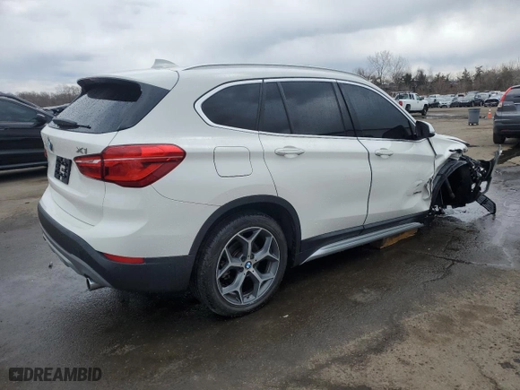 2017 BMW X1 xDrive28i with VIN WBXHT3C31H5F85452, listed as a Copart auction lot 50351125 with 61,954 mi miles and Salvage Title. Bid and sale history available at carsss.com. Image 3.