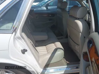 2003 Jaguar XJ 8 with VIN SAJDA14C03LF52338, listed as a IAAI auction lot 42684038 with 142,107 mi miles and . Bid and sale history available at DreamBid. Image 8.