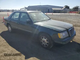1995 Mercedes-Benz E Class with VIN WDBEA32E4SC205978, listed as a Copart auction lot 60329354 with 240,082 mi miles and Salvage Title. Bid and sale history available at carsss.com. Image 4.