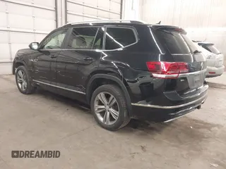 2018 Volkswagen Atlas SEL z VIN 1V2RR2CAXJC548261, wystawiony jako IAAI lot #41650478 z przebiegiem 123 399 mil mil oraz . Historia ofert i sprzedaży dostępna na DreamBid. Obrazek 3.