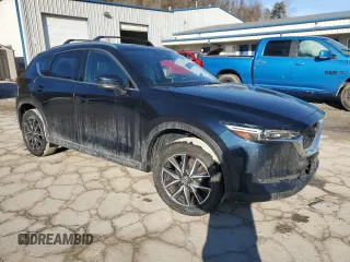 2018 Mazda CX-5 Grand Touring with VIN JM3KFBDM8J0399975, listed as a Copart auction lot 45998115 with 98,037 mi miles and Salvage Title. Bid and sale history available at DreamBid. Image 4.