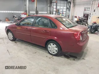 2007 Suzuki Forenza z VIN KL5JD56Z47K599789, wystawiony jako IAAI lot #41747725 z przebiegiem 145 029 mil mil oraz . Historia ofert i sprzedaży dostępna na DreamBid. Obrazek 3.