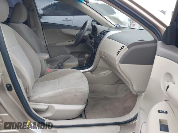 2009 Toyota Corolla with VIN 1NXBU40E99Z118081, listed as a IAAI auction lot 42086882 with 199,328 mi miles and . Bid and sale history available at DreamBid. Image 5.