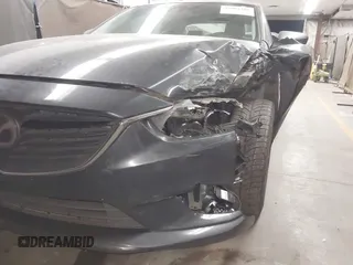 2015 Mazda 6 i Grand Touring with VIN JM1GJ1W58F1199550, listed as a IAAI auction lot 42064381 with 145,465 mi miles and . Bid and sale history available at carsss.com. Image 6.