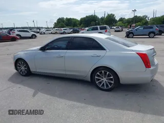 2016 Cadillac CTS with VIN 1G6AR5SS9G0194126, listed as a IAAI auction lot 41972437 with 129,742 mi miles and . Bid and sale history available at DreamBid. Image 14.