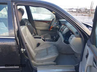 1997 Mercedes-Benz E-Class with VIN WDBJF72F1VA281514, listed as a IAAI auction lot 41586496 with 283,212 mi miles. Bid and sale history available at carsss.com. Image 5.