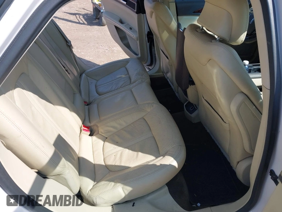 2013 Lincoln MKZ z VIN 3LN6L2G9XDR823893, wystawiony jako IAAI lot #42003836 z przebiegiem 170 937 mil mil oraz . Historia ofert i sprzedaży dostępna na DreamBid. Obrazek 8.