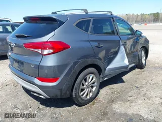 2017 Hyundai Tucson Value with VIN KM8J33A23HU405296, listed as a IAAI auction lot 41887237 with 114,027 mi miles. Bid and sale history available at carsss.com. Image 4.