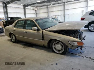 2000 Mercury Grand Marquis LS z VIN 2MEFM75W9YX660599, wystawiony jako Copart lot #52620225 z przebiegiem 88 726 mil mil oraz Szkoda całkowita • Salvage title. Historia ofert i sprzedaży dostępna na DreamBid. Obrazek 4.