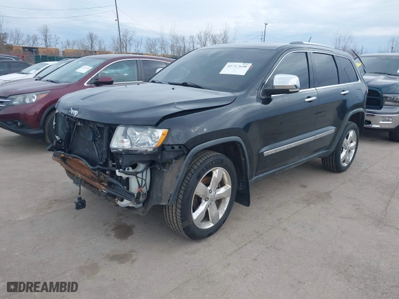 2012 Jeep Grand Cherokee Overland with VIN 1C4RJFCG3CC148601, listed as a IAAI auction lot 41717658 with 127,681 mi miles. Bid and sale history available at carsss.com. Image 18.