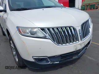 2012 Lincoln MKX z VIN 2LMDJ8JKXCBL01858, wystawiony jako IAAI lot #42221692 z przebiegiem 89 470 mil mil oraz . Historia ofert i sprzedaży dostępna na DreamBid. Obrazek 18.