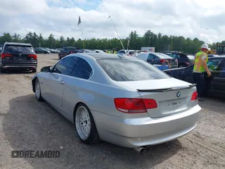 2007 BMW 3 Series 328xi with VIN WBAWC33587PC86076, listed as a IAAI auction lot 42695543 with 158,141 mi miles and . Bid and sale history available at DreamBid. Image 3.