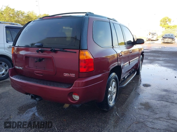 2003 GMC Envoy SLT with VIN 1GKDS13S132118361, listed as a IAAI auction lot 41909425 with 283,342 mi miles. Bid and sale history available at carsss.com. Image 4.