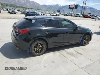 2014 Mazda 3 i Touring with VIN JM1BM1L74E1148214, listed as a Copart auction lot 54272605 with 158,278 mi miles and Salvage title. Bid and sale history available at DreamBid. Image 3.