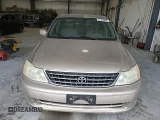 2003 Toyota Avalon XL z VIN 4T1BF28B03U280486, wystawiony jako Copart lot #57152935 z przebiegiem 131 996 mil mil oraz Szkoda całkowita • Salvage title. Historia ofert i sprzedaży dostępna na DreamBid. Obrazek 5.