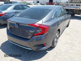 2019 Honda Civic Sedan LX with VIN 19XFC2F63KE025722, listed as a IAAI auction lot 42045594 with 57,290 mi miles. Bid and sale history available at carsss.com. Image 4.