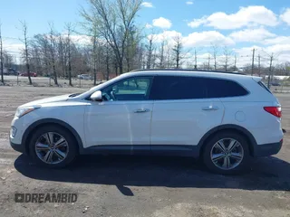 2014 Hyundai Santa Fe Limited z VIN KM8SNDHF8EU080086, wystawiony jako IAAI lot #41995020 z przebiegiem 168 532 mil mil oraz . Historia ofert i sprzedaży dostępna na DreamBid. Obrazek 14.