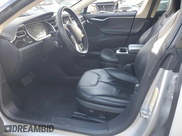 2013 Tesla Model S with VIN 5YJSA1AC8DFP10890, listed as a Copart auction lot 60735174 with 51,847 mi miles and Clean Title. Bid and sale history available at DreamBid. Image 7.