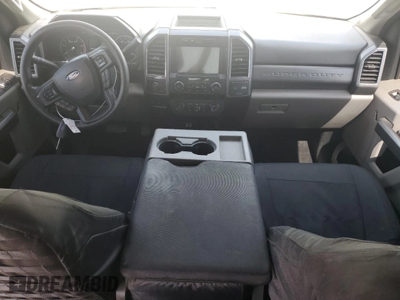 2019 Ford F-250 XL with VIN 1FT7W2BT0KEC17148, listed as a Copart auction lot 61570235 with 101,065 mi miles and Salvage title. Bid and sale history available at DreamBid. Image 8.