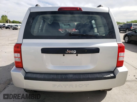 2010 Jeep Patriot Sport z VIN 1J4NT2GB4AD523378, wystawiony jako Copart lot #57088185 z przebiegiem 119 937 mil mil oraz Szkoda całkowita • Salvage title. Historia ofert i sprzedaży dostępna na DreamBid. Obrazek 6.