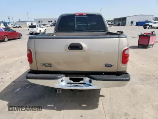 2001 Ford F-150 XLT z VIN 1FTRW07L01KB30498, wystawiony jako Copart lot #57157585 z przebiegiem 343 041 mil mil oraz Szkoda całkowita • Salvage title. Historia ofert i sprzedaży dostępna na DreamBid. Obrazek 6.