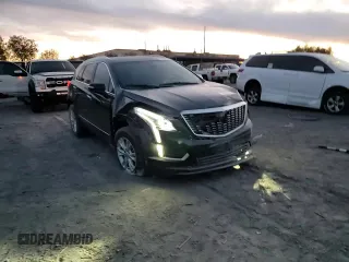 2021 Cadillac XT5 FWD Luxury with VIN 1GYKNAR45MZ109538, listed as a Copart auction lot 82933514 with 34,654 mi miles and Salvage Title. Bid and sale history available at carsss.com. Image 12.