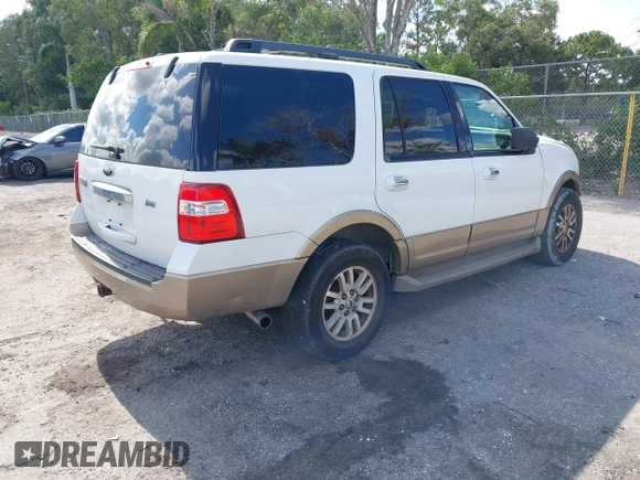 2014 Ford Expedition King Ranch with VIN 1FMJU1J50EEF14445, listed as a IAAI auction lot 42571073 with 125,174 mi miles and . Bid and sale history available at DreamBid. Image 4.