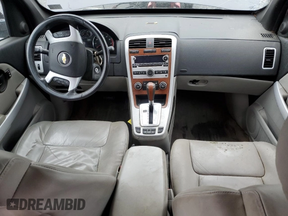 2007 Chevrolet Equinox LT z VIN 2CNDL73F976119101, wystawiony jako Copart lot #57047295 z przebiegiem 128 440 mil mil oraz Szkoda całkowita • Salvage title. Historia ofert i sprzedaży dostępna na DreamBid. Obrazek 8.