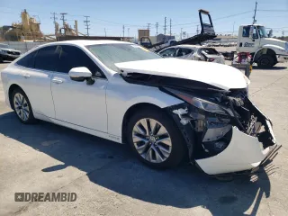 2023 Toyota Mirai XLE with VIN JTDAAAAA3PA009732, listed as a Copart auction lot 68083874 with 12,563 mi miles and Salvage Title. Bid and sale history available at carsss.com. Image 4.
