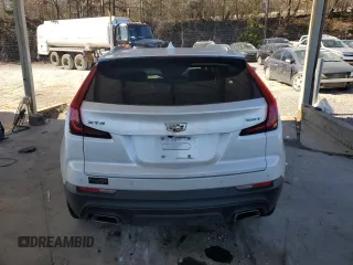 2021 Cadillac XT4 FWD Luxury с VIN 1GYAZAR47MF023407, выставлен на аукционе Copart как лот 88633325 с пробегом 77 353 миль миль и Списание • Salvage title. История ставок и продаж доступна на DreamBid. Изображение 6.