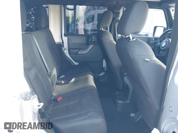 2018 Jeep Wrangler Unlimited Sport S with VIN 1C4HJWDG5JL839703, listed as a IAAI auction lot 42140205 with 61,604 mi miles and . Bid and sale history available at DreamBid. Image 8.